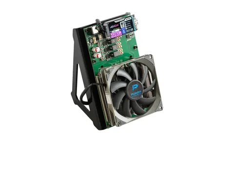 NerdQaxe++ on its black stand, screen lit, with its large fan and finned heatsink